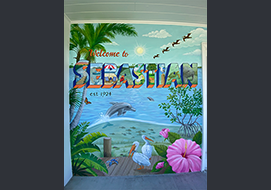 This street mural depicts 'Aspects of Life along the Indian River' in the city of Sebastian, FL. It is located on the Chamber of Commerce building. Completed in 2024.